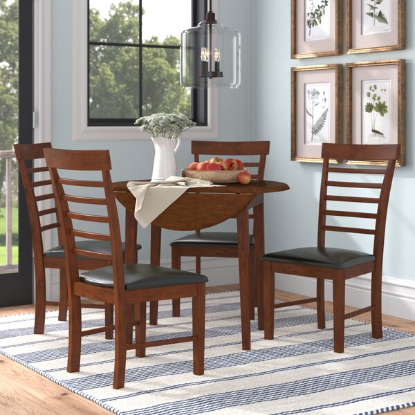 Dark wood table with deals white chairs